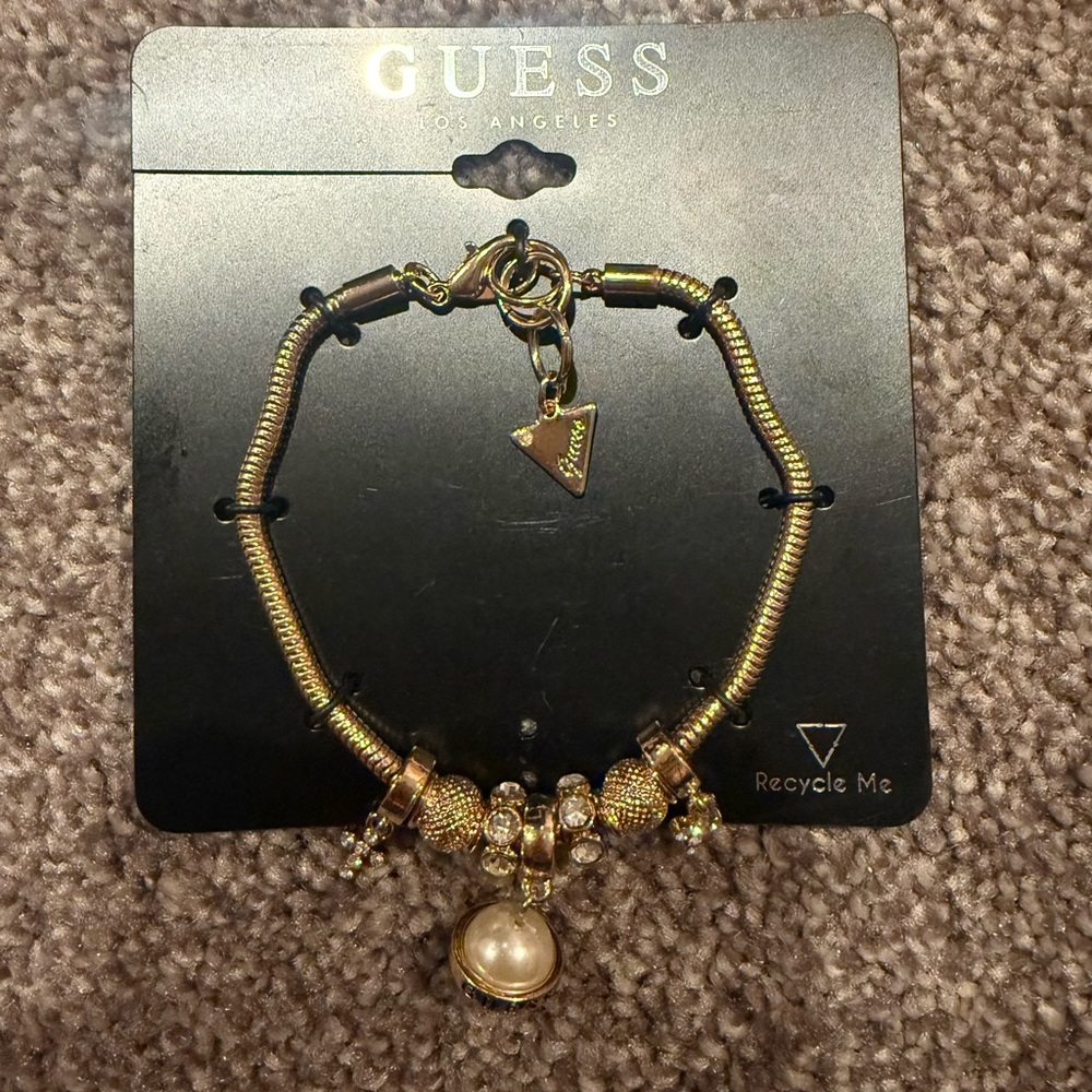 Guess Gold Tone Pearl & Crystal Charm Bracelet